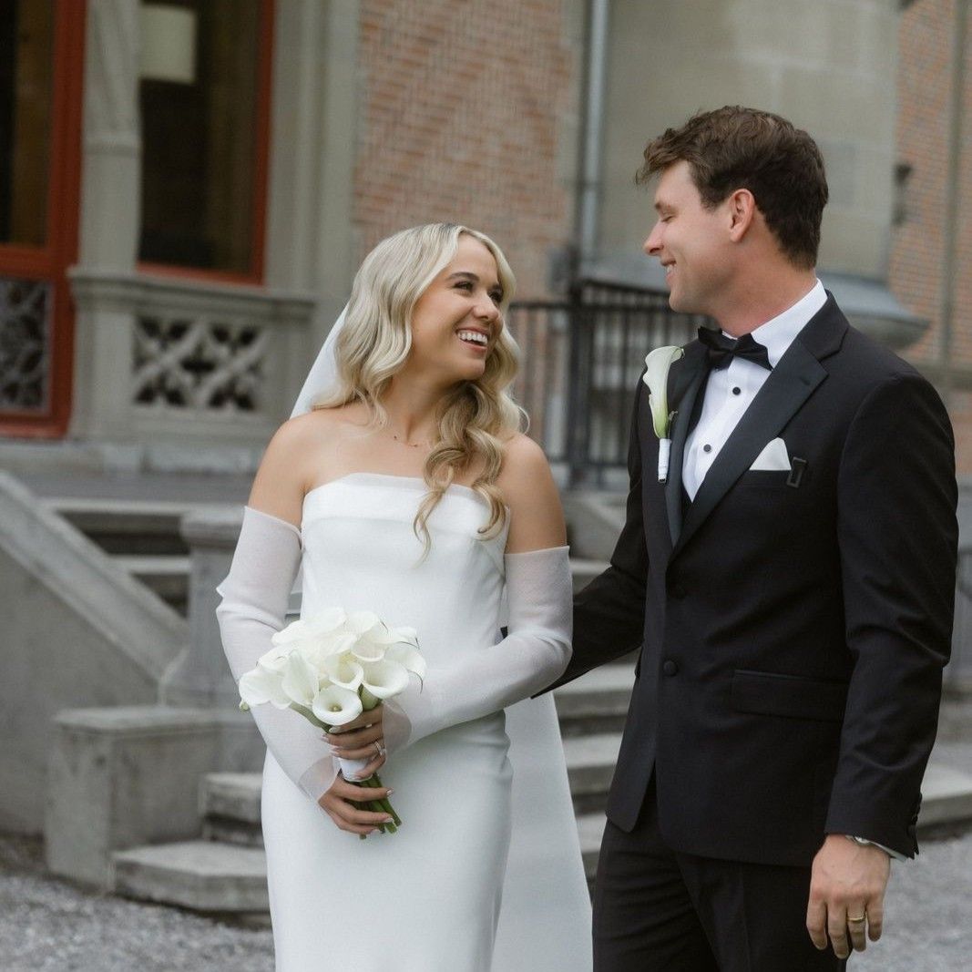 Bride and groom laughing at their destination wedding in Austria