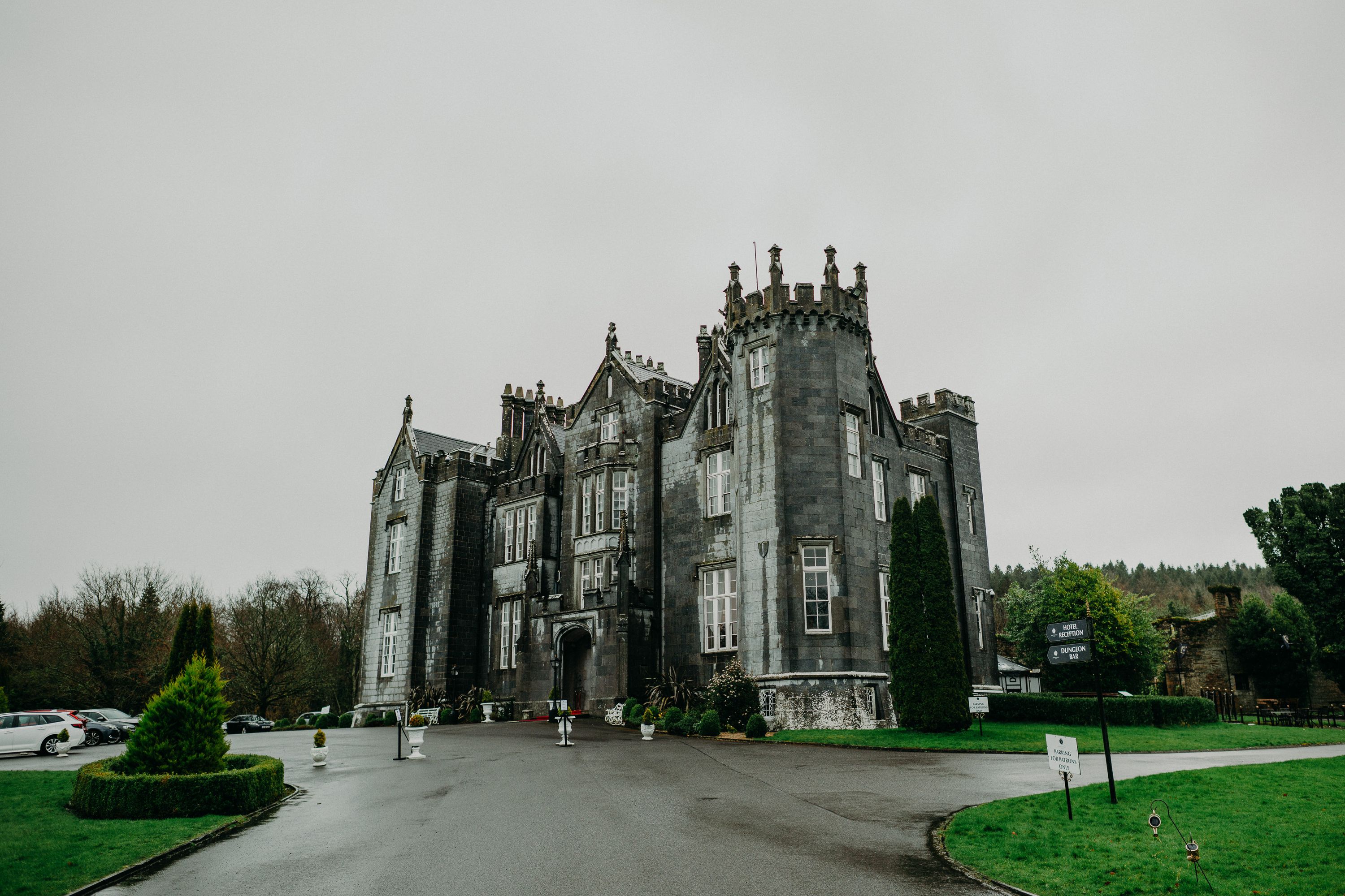 Historic Kinnitty Castle exterior hosting an intimate wedding in Ireland surrounded by lush countryside