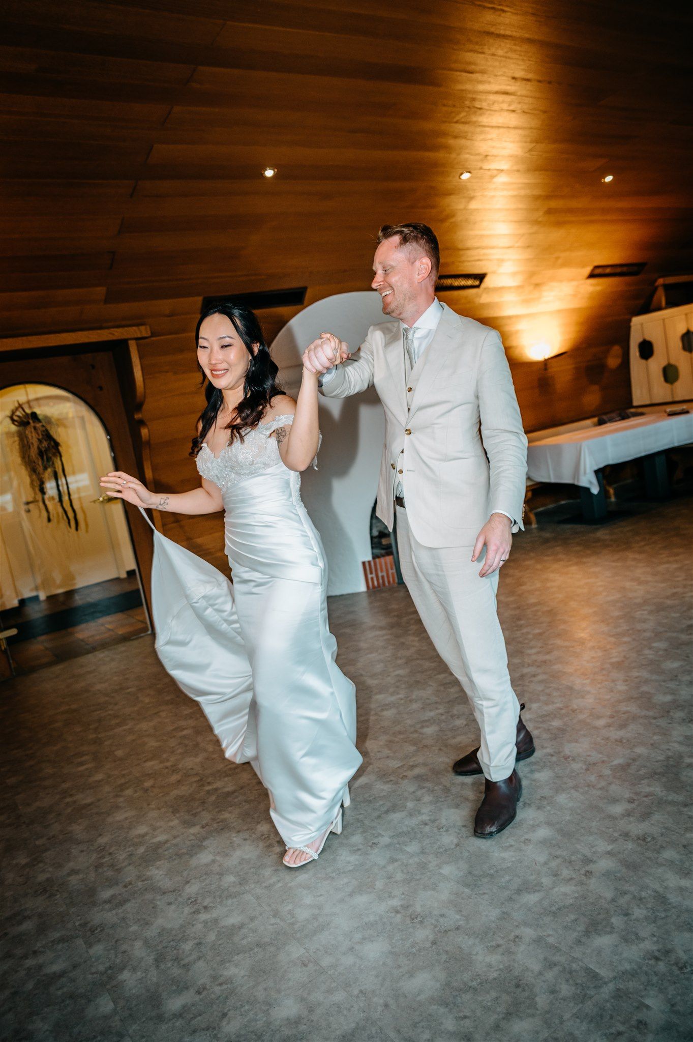 A bride and groom dancing during the reception for their small wedding in Germany