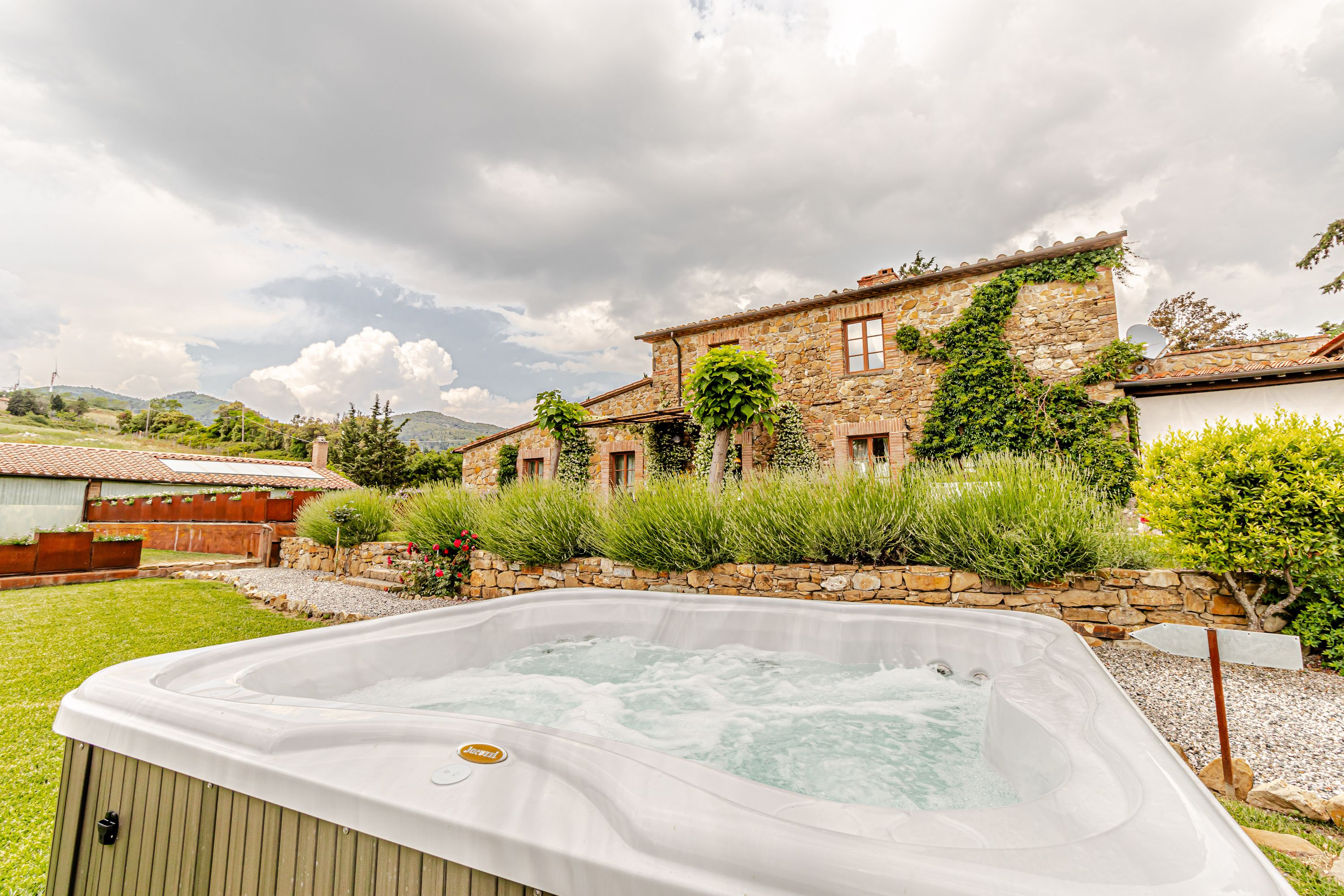 Boutique winery and farmhouse with panoramic mountain views for destination weddings in Tuscany