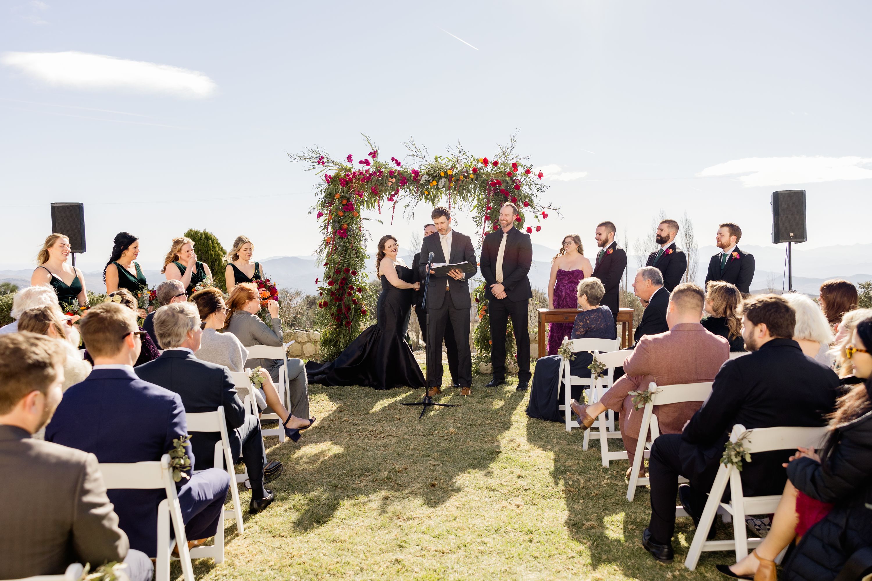 Black-themed outdoor destination wedding in Spain during winter in a farmhouse in Alenquer