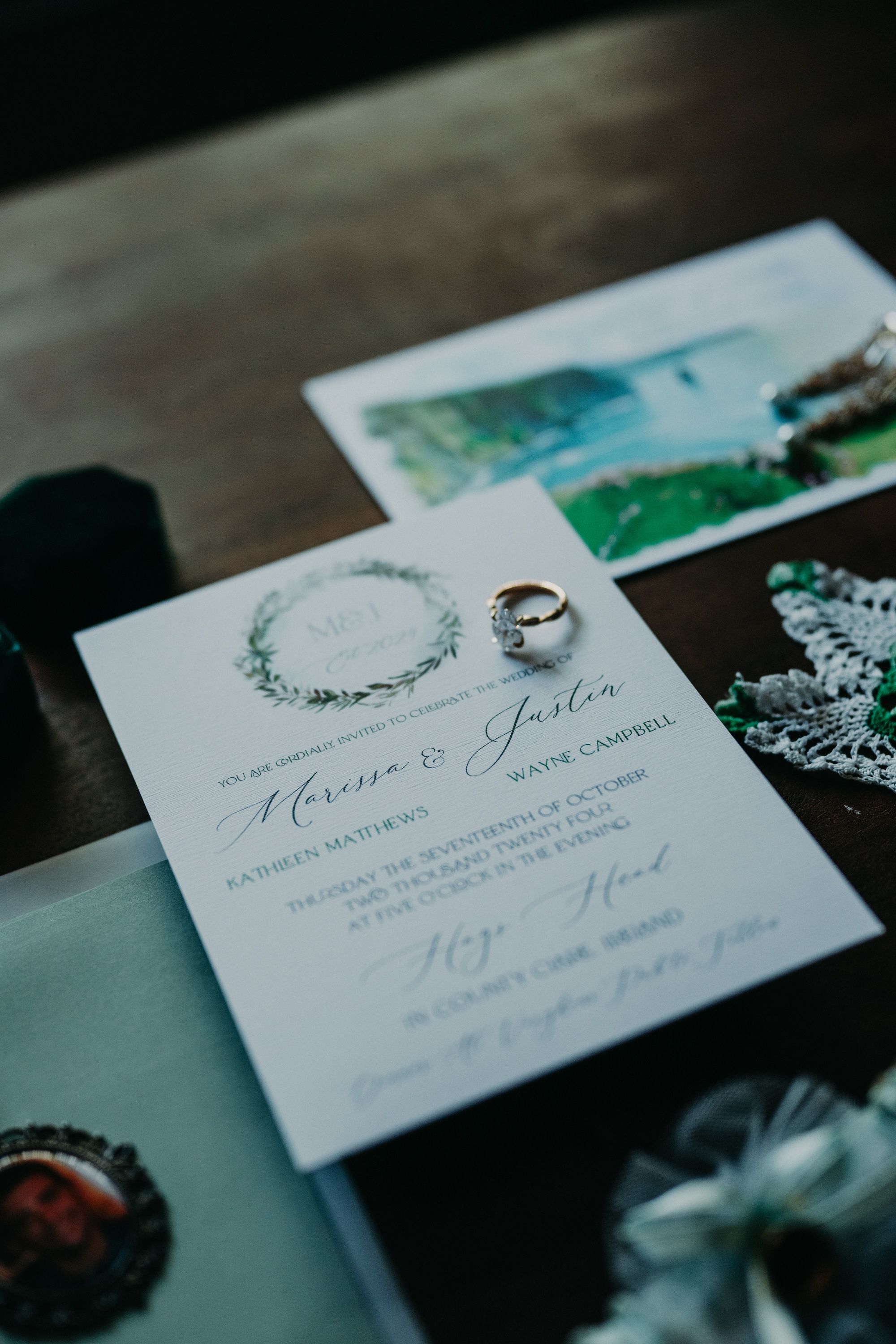 An invitation for a small wedding in Ireland with the picture of the Cliffs of Moher in the background