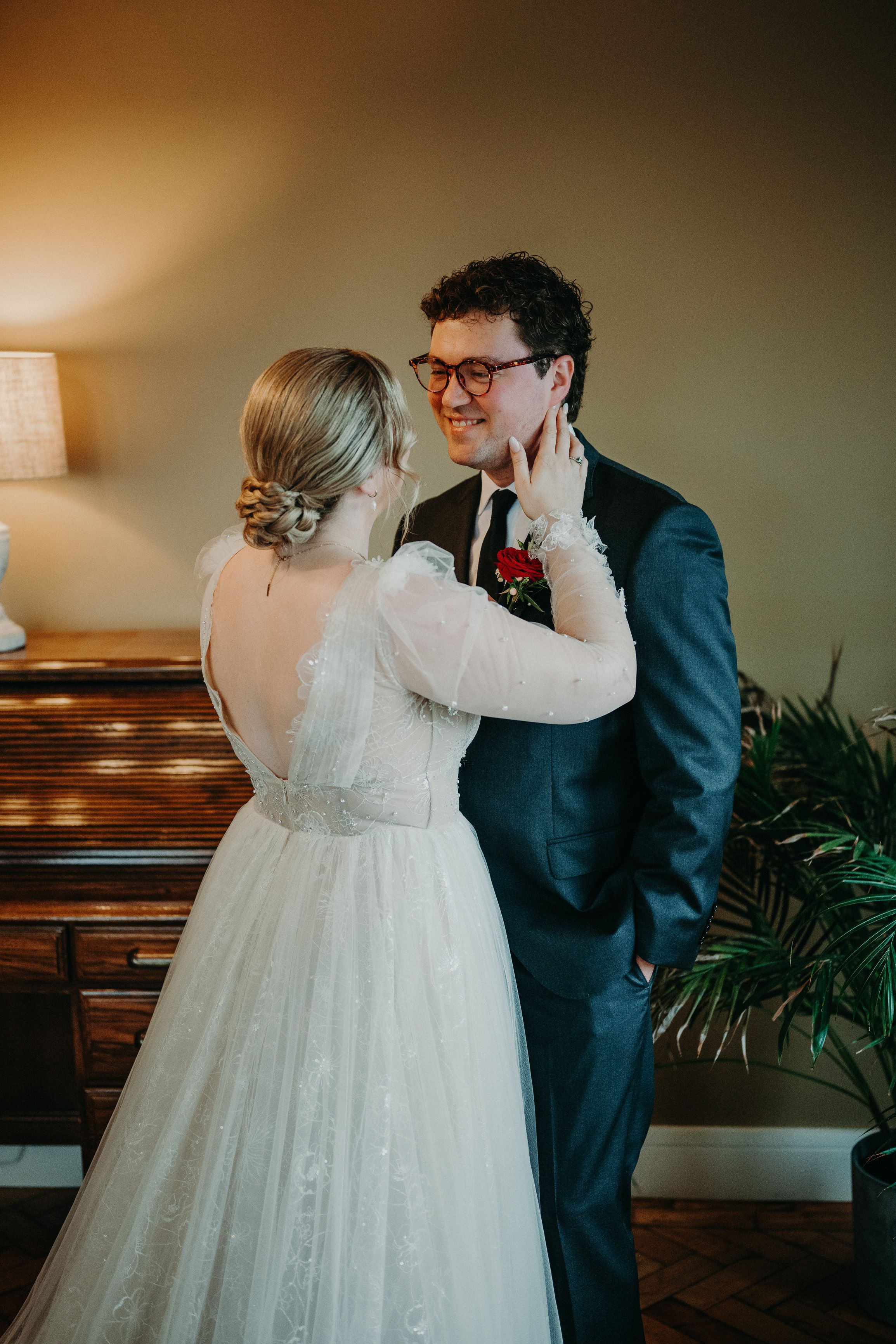 Bride smiling at her groom during a romantic first look at a small wedding in Ireland