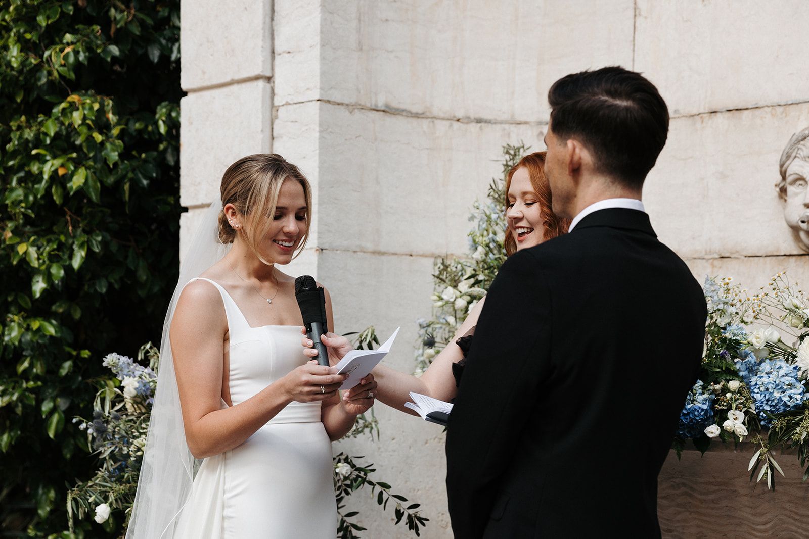 Bride and groom having a garden ceremony during their destination wedding in Portugal