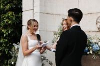 Bride and groom having a garden ceremony during their destination wedding in Portugal