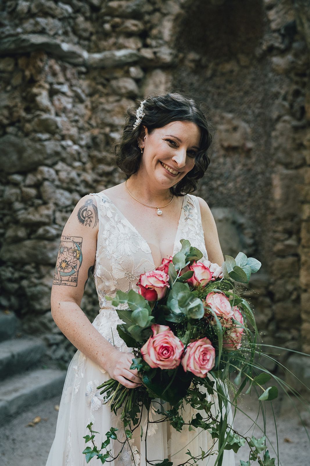 A bride holding her bouquet for a small wedding