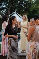 Our destination wedding planner in Italy talks to the bride during the reception