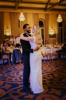 Newlyweds perform their first dance during the reception of their intimate wedding in Portugal