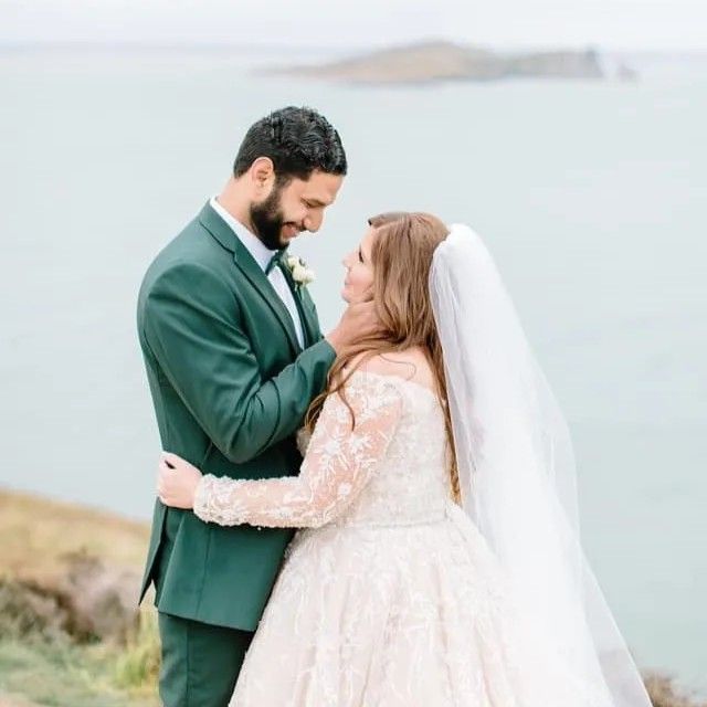 Bride and groom posing on their wedding day in Ireland