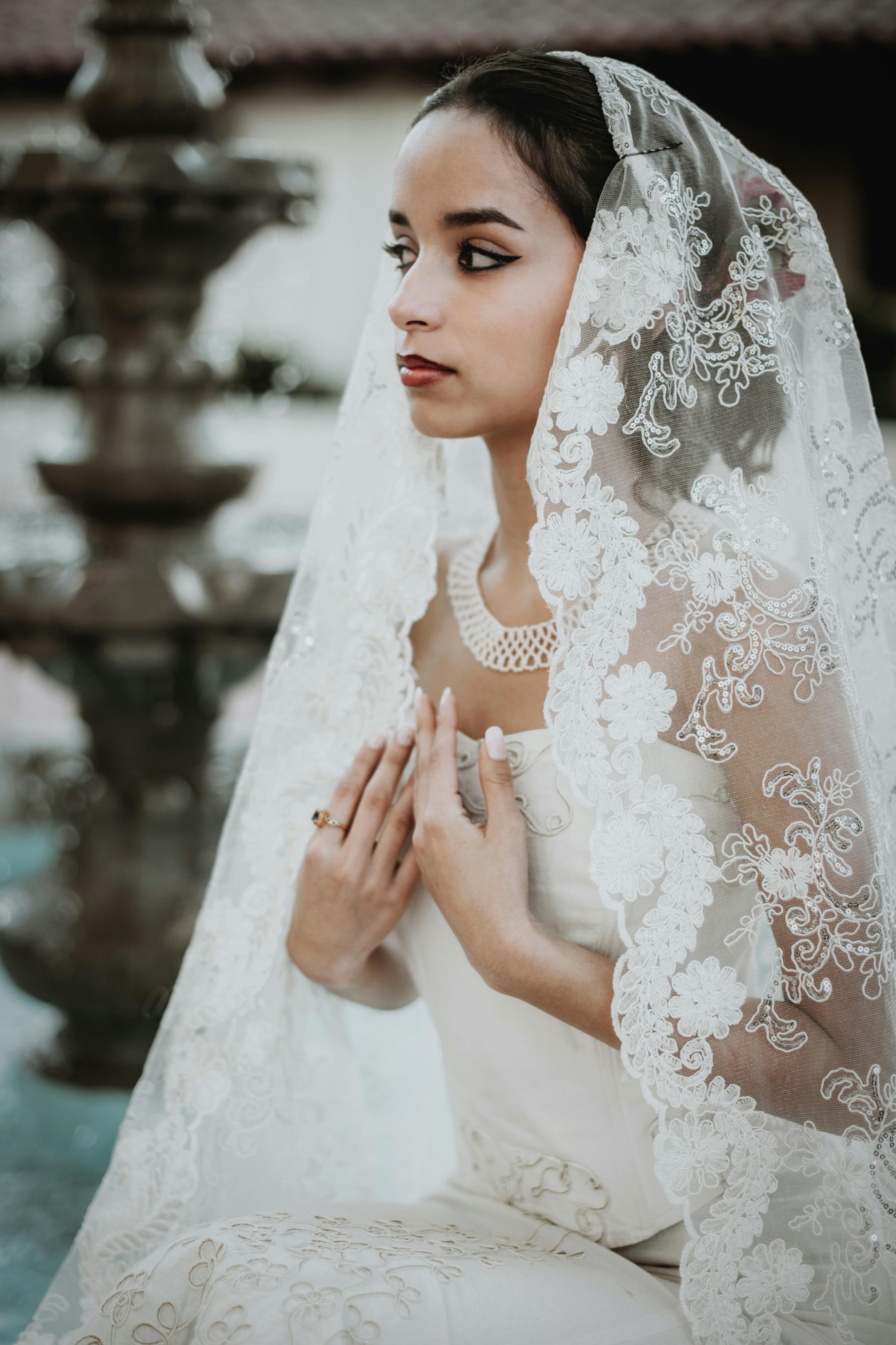 young woman wearing a Spanish mantilla veil