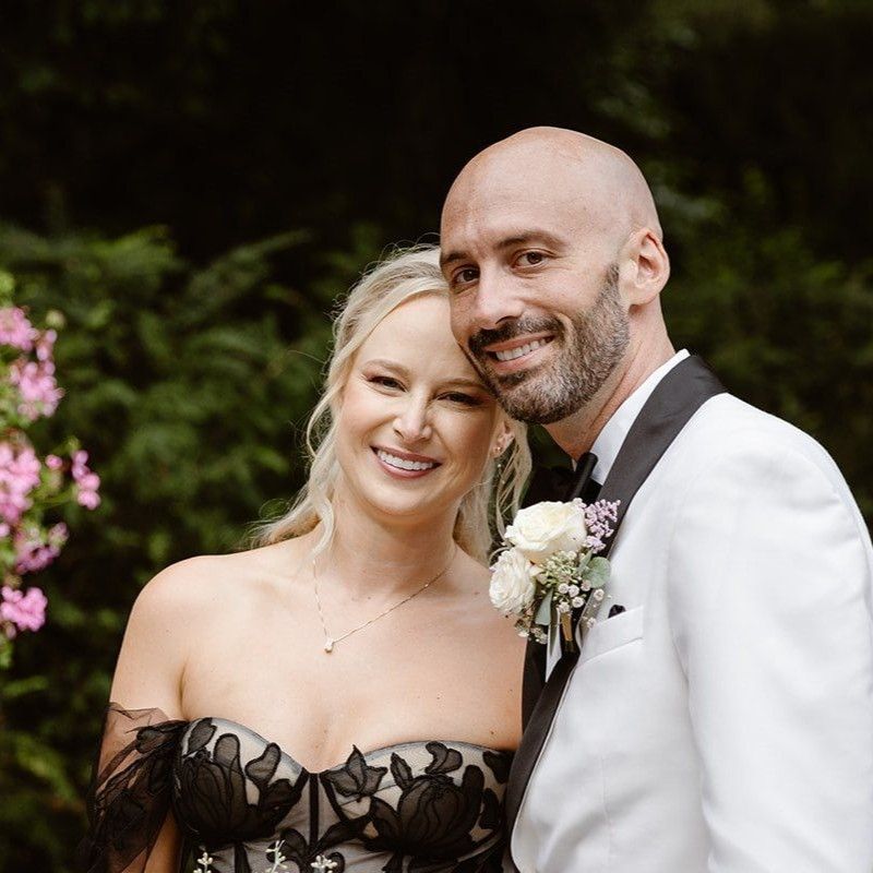 Bride and groom posing for a photo