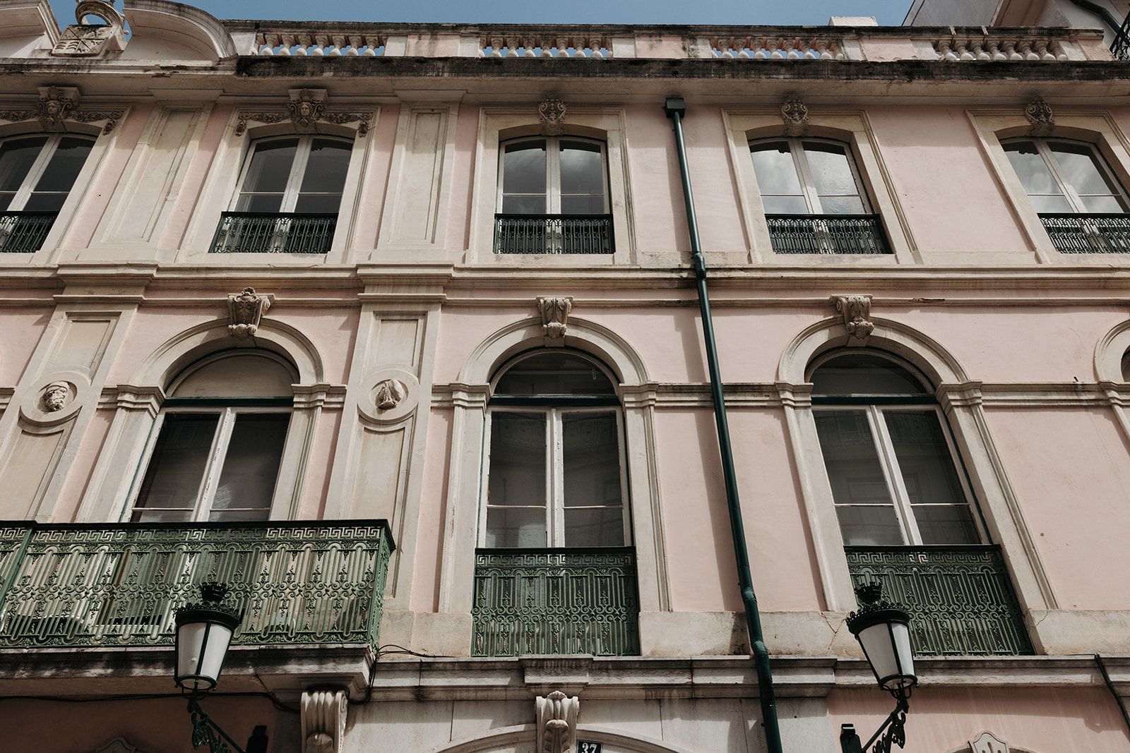White historic palace with arched windows in Portugal