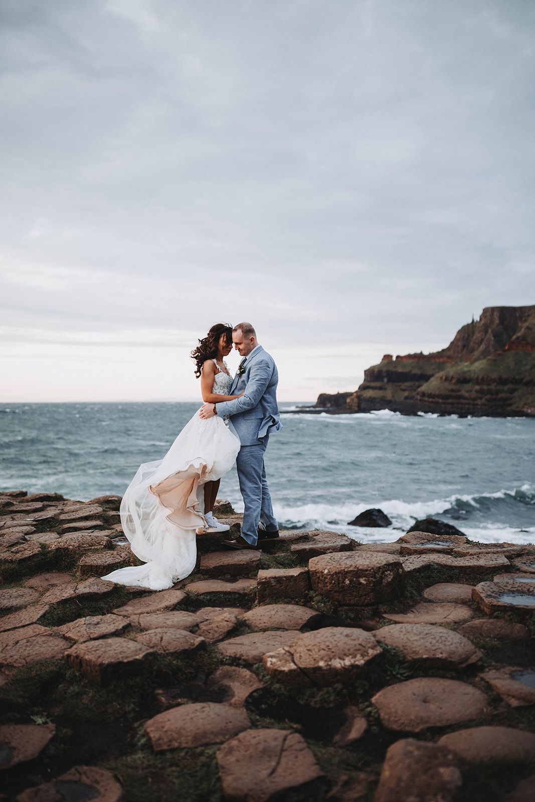 Bride and groom at Giant's Causeway in Northern Ireland