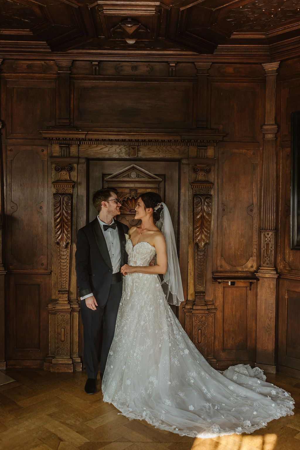 A bride and groom inside a castle for the reception during their small wedding in Switzerland