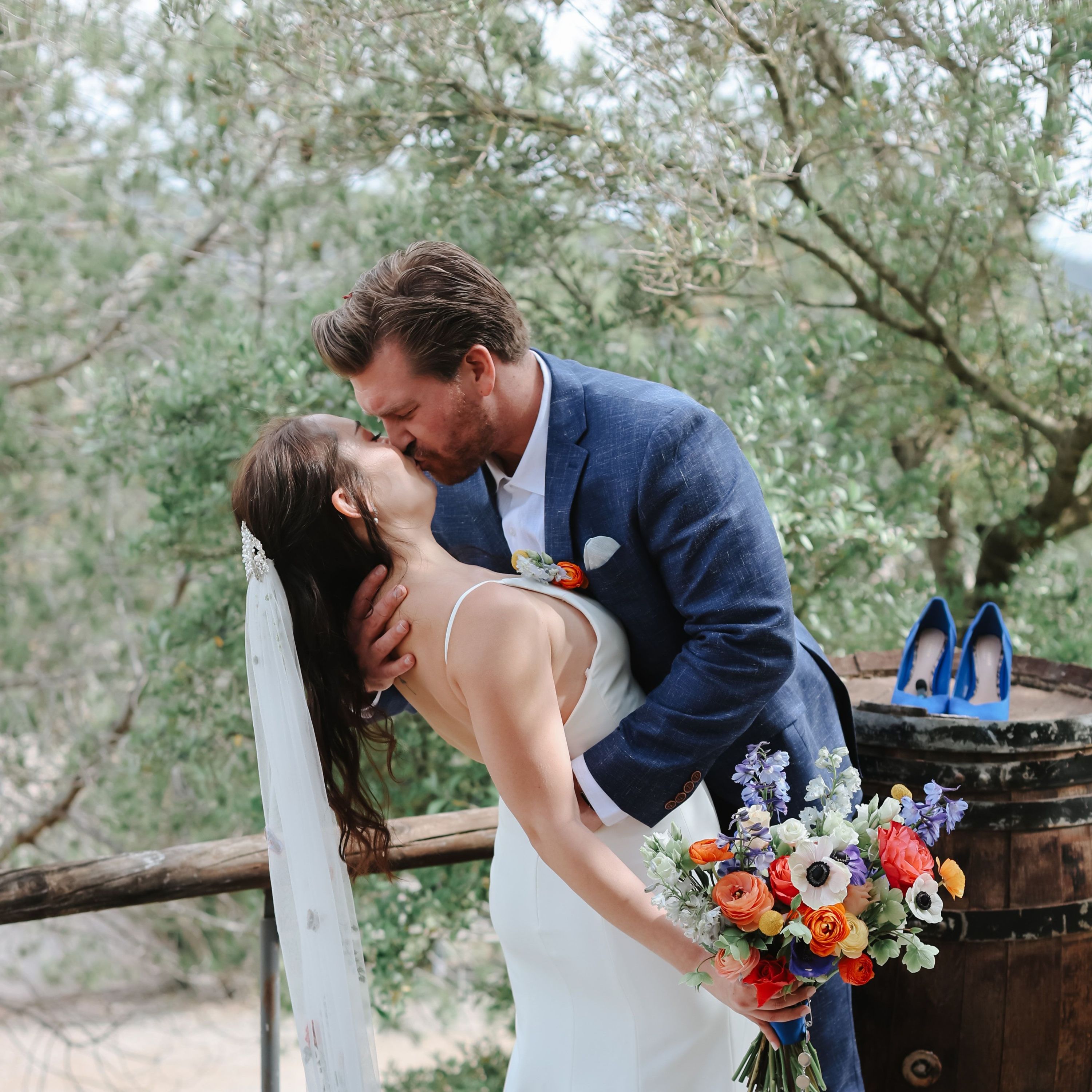Bride and groom kissing on their wedding day in Spain