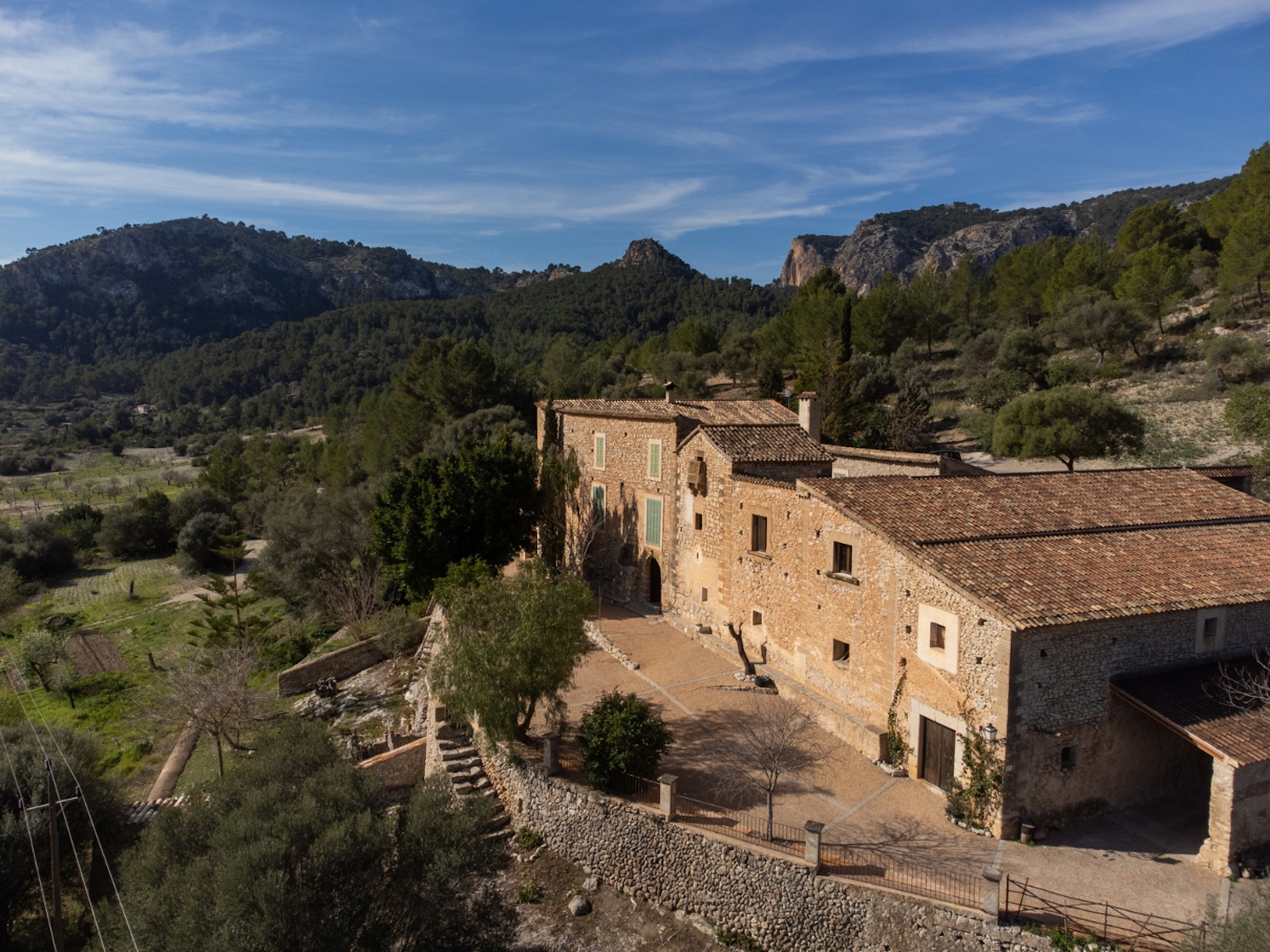 13th-century country house for destination weddings in Spain, surrounded by Mallorca's green landscapes