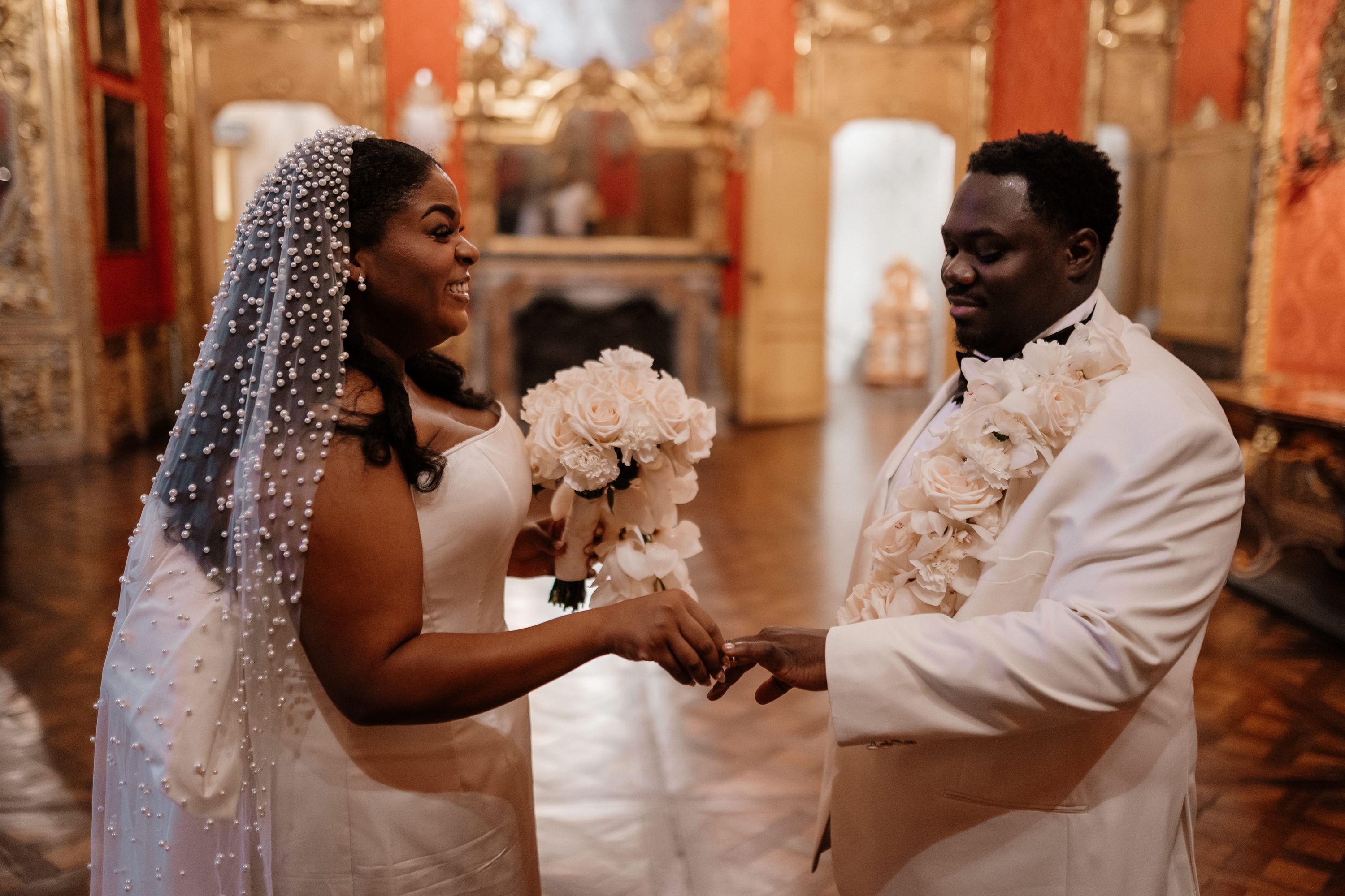 Bride and groom having a wedding ceremony inside a museum in Turin during their elopement in Italy