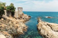 Beach for weddings Spain with white rocks and a gazebo.