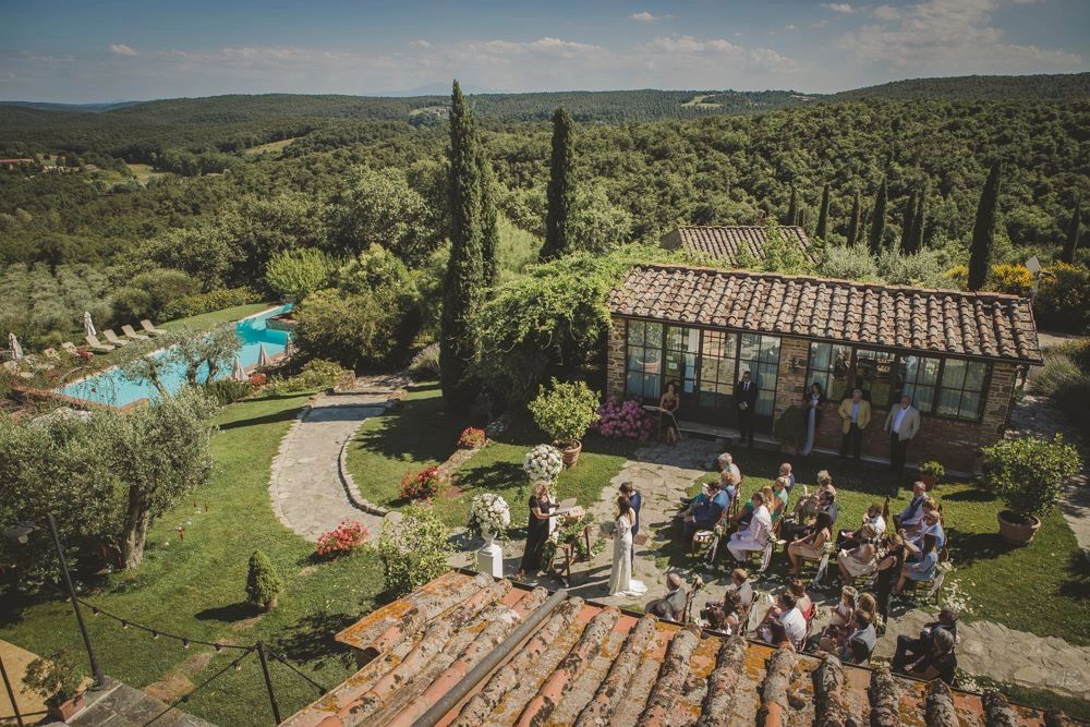 Rustic building in an estate with views of rolling hills and Tuscan countryside